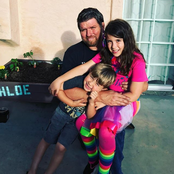 Jim Bell with two kids